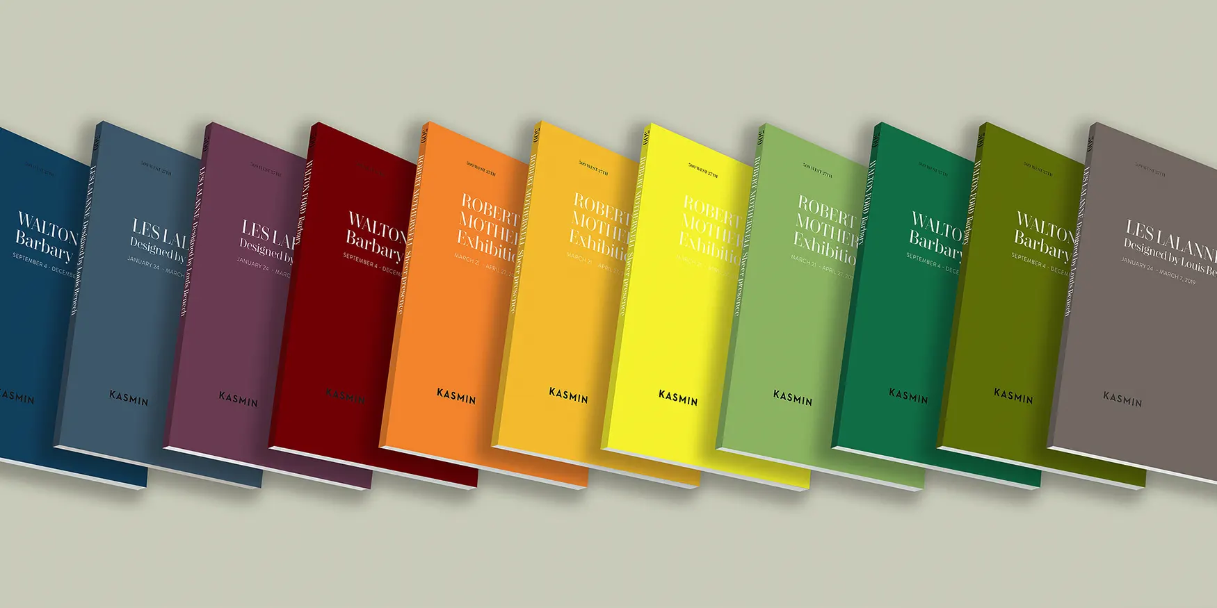 Kasmin exhibition catalogues fanned out in a spectrum of cover colors