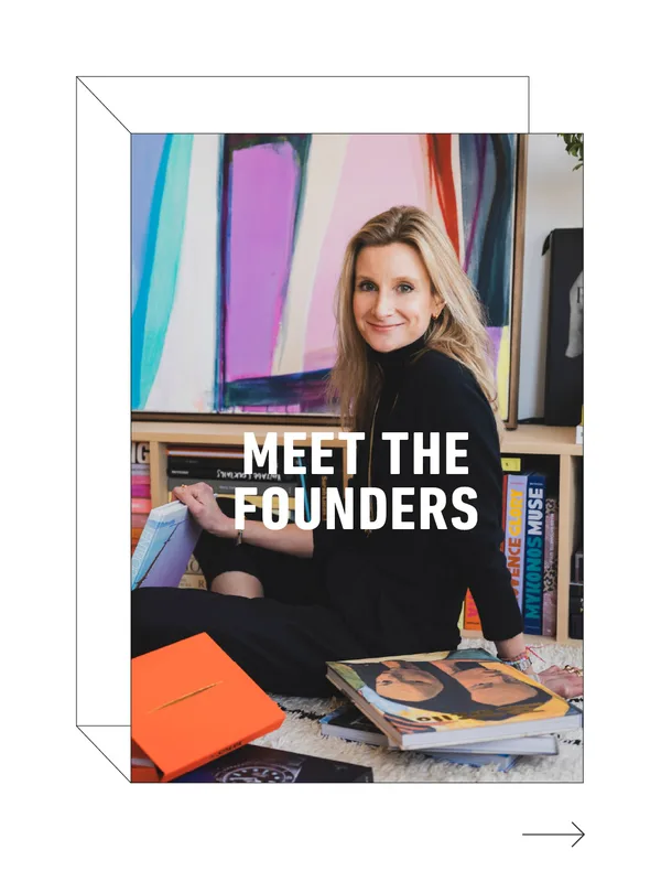 Meet the Founders: a PRINT founder seated with books in front of a colorful painting